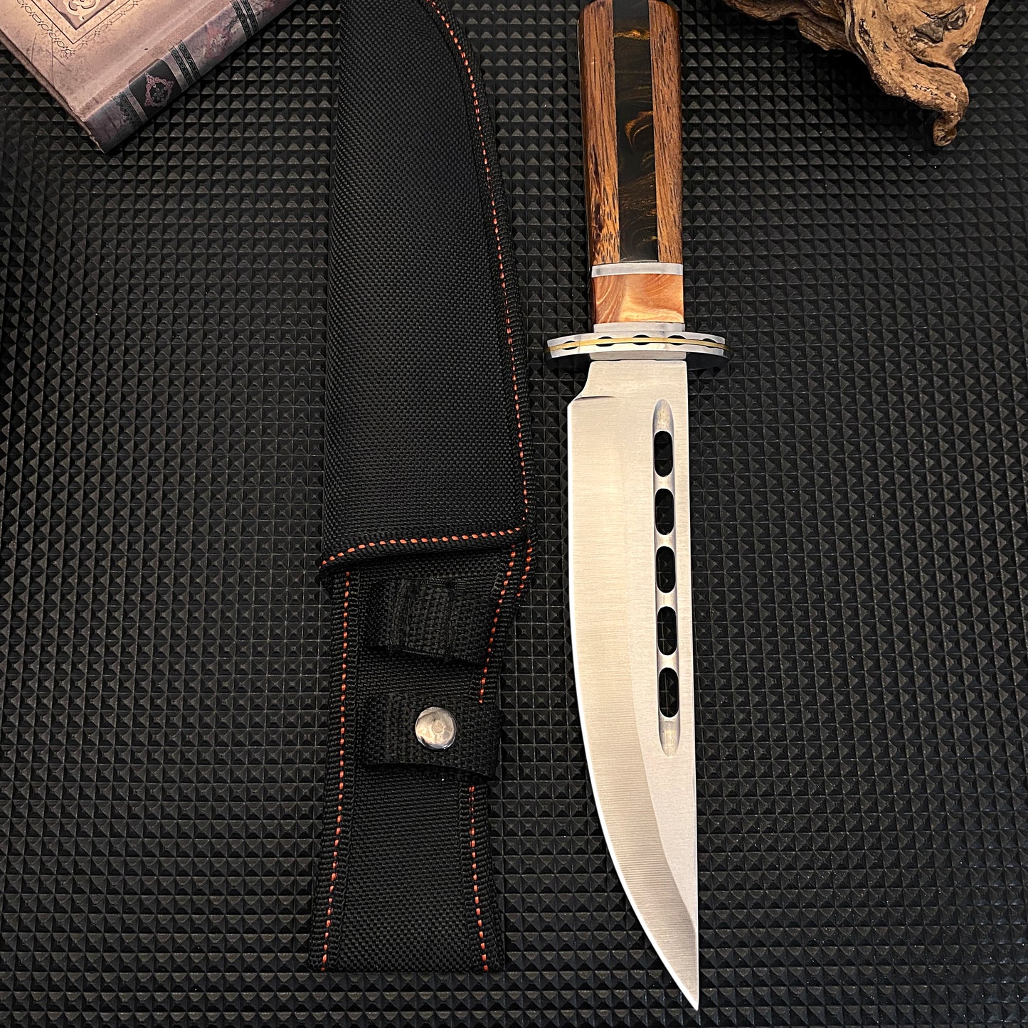 Outdoor tactical straight knife with wooden handle, featuring a nylon sheath—ideal for wilderness expeditions.