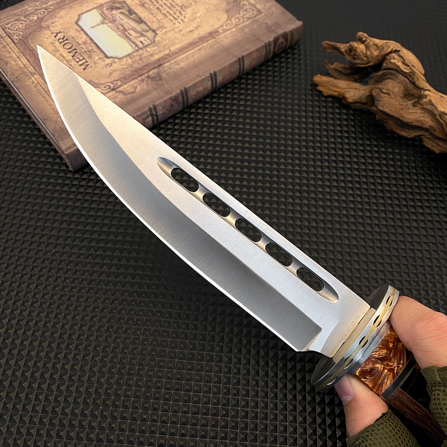Outdoor tactical straight knife with wooden handle, featuring a nylon sheath—ideal for wilderness expeditions.